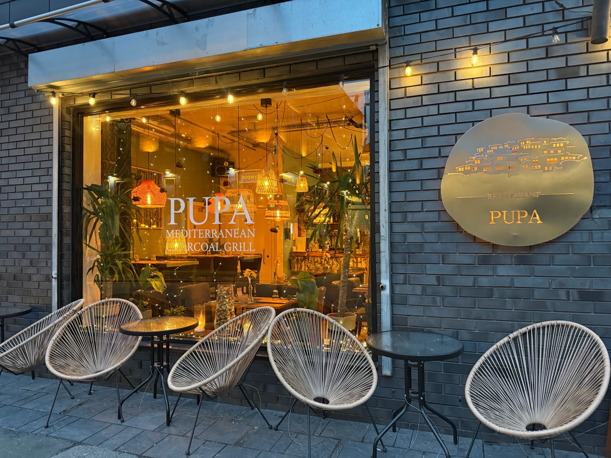 Pupa Restaurant exterior in the evening