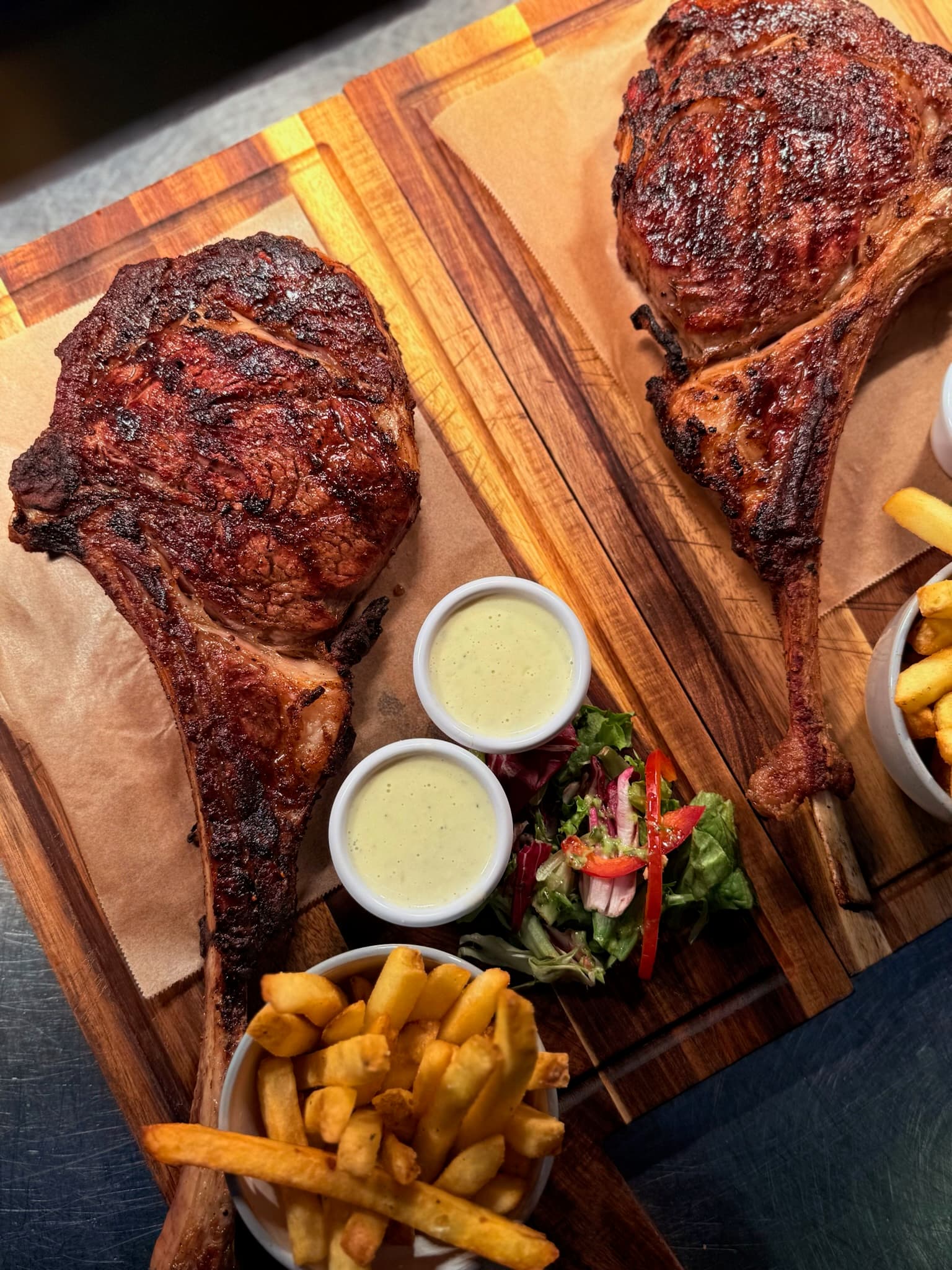 Tomahawk steaks at Pupa